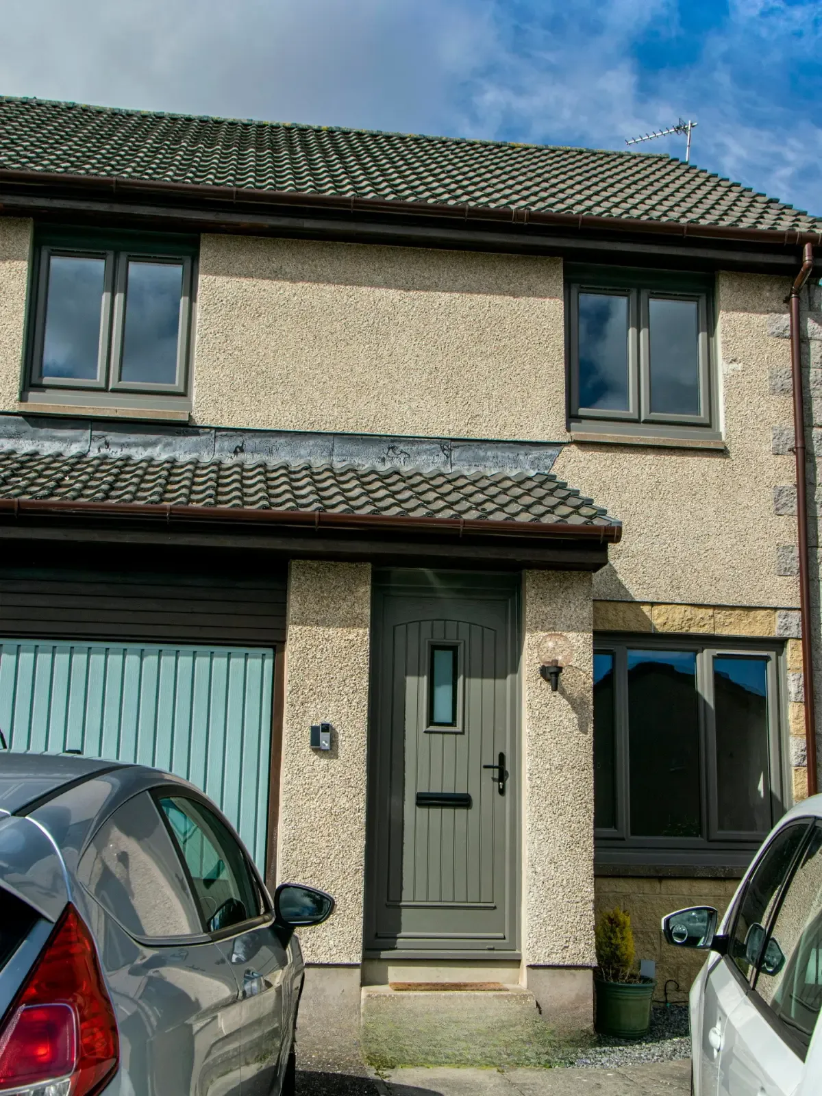 Anthracite grey composite front door installed in a Dundee home