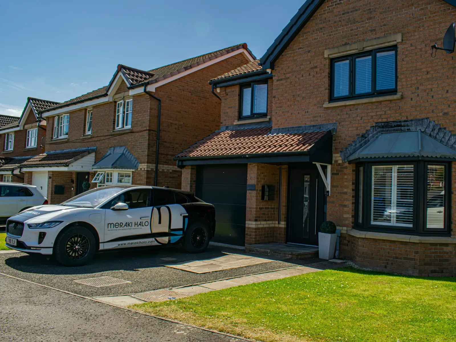 Black composite front door installation, Dundee